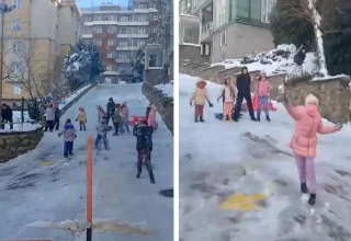 Çocuklar kar küreme aracını kar topu ile püskürttü
